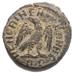 reverse: Divus Constantius I Æ Nummus. Rome, AD 317-318. DIVO CONSTANTIO PIO PRINC, laureate, veiled and draped head right / MEMORIAE AETERNAE, eagle standing right, head and tail left, with wings displayed; RP in exergue. 2.3g, 15.8mm aEF Very Fine.
