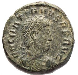 obverse: Gratian Ӕ Nummus. Thessalonica, AD 367-375. D N GRATIANVS P F AVG, pearl-diademed, draped and cuirassed bust right / SECVRITAS REIPVBLICAE, Victory advancing left, with wreath and palm; Γ and (star) in left field, TES in exergue. RIC 27c. 2.92g, 18.25 mm, green patina.Good Very Fine.