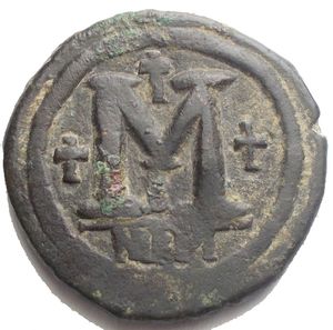 reverse: Giustiniano I. 527-565 d.C. AE Follis. Nicomedia. D/ Busto di Giustiniano a destra . R/ Grande M a sinistra e sopra croce, a destra croce esergo NIK N Peso 18,4 gr. Diametro 31,06 mm.