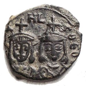 obverse: Michael II the Amorian, 820-829. Follis (Bronze 17.2 mm, 3.22 g) Syracuse. [MIXA]HL S ΘЄO(F) Facing busts of Michael II, bearded, wearing chlamys, on the left, and Theophilus, beardless, wearing loros, on the right, both wearing crown surmounted by cross. Rev. Large M; above, cross; below, Θ. DOC 21. SB 1652. Good VF/about extremely fine.