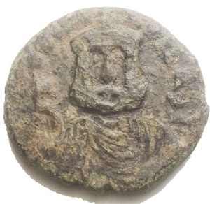 obverse: Siracusa. TEOFILO (829-842). Follis Ae. D/ Busto frontale di Teofilo con globo crucifero R/ Grande M, sopra croce, sotto lettera, a sn XXX in verticale, a ds (NNN) in verticale. Sp. 431. g 4,52. mm 20,3 x 19.3. BB/qBB