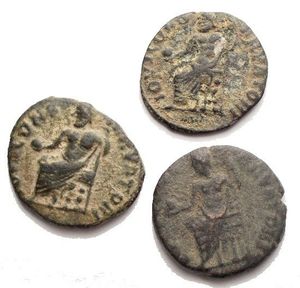 obverse: Time of Maximinus II Æ  Persecution Issue . Antioch, AD 310-313. IOVI CONSERVATORI, Jupiter seated left on throne, holding globe and sceptre / VICTORIA AVGG, Victory advancing left with wreath and palm,  g 1,77-0,98-1,81. Good Fine - Good Very Fine. Patina