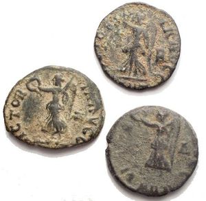 reverse: Time of Maximinus II Æ  Persecution Issue . Antioch, AD 310-313. IOVI CONSERVATORI, Jupiter seated left on throne, holding globe and sceptre / VICTORIA AVGG, Victory advancing left with wreath and palm,  g 1,77-0,98-1,81. Good Fine - Good Very Fine. Patina
