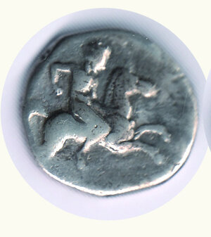 obverse: MAGNA GRECIA - Taranto (280 a.C. circa); D/ Cavaliere al galoppo; R/ Tars su delfino che regge un elmo.