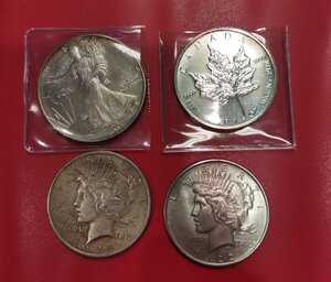 obverse: Lotto 4 monete USA e CANADA da 1 dollaro in argento interessanti.
