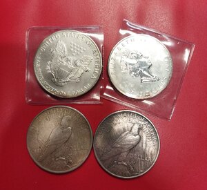 reverse: Lotto 4 monete USA e CANADA da 1 dollaro in argento interessanti.
