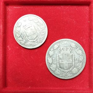reverse: Lotto Regno d Italia. 2 pz. di UMBERTO I – Lire 2 del 1884 e Lire 1 del 1886. Argento. Conservazioni come da foto.