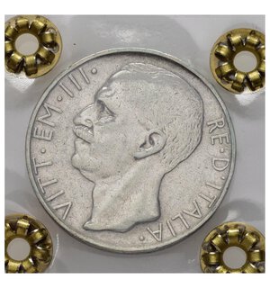 obverse: Regno d Italia. Vittorio Emanuele III (1900-1943). 10 lire 1928 ** due rosette 