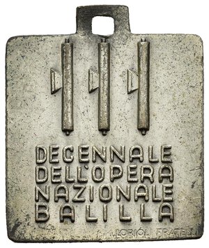 reverse: Medaglie Italiane – Regno D’Italia – Vittorio Emanuele III (1900-1945) – Ventennio Fascista (1922-1943) – ONB - Balilla. Medaglia, di forma quadrata, con attacco squadrato emessa nel 1936 nel decennale di fondazione dell’Opera Nazionale Balilla. Al dritto profilo stilizzato di Mussolini, dietro Balilla con moschetto in marcia verso s., in basso a s. ONB in basso a d. IV XIV 1926 1936. Al verso tre fasci verticali e legenda DECENNALE DELL’OPERA NAZIONALE BALILLA, in basso a d. LORIOLI FRATELLI. Coniata in bronzo argentato (AE) (39x41mm, 9,7g.). Conservazione SPL. Riferimenti Casolari XIV-67. Opus Giannino Castiglioni