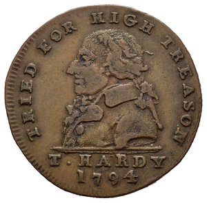 obverse: Gettoni Esteri – Gran Bretagna – Gettone dal valore di ½ penny – Middlesex – Thomas Hardy. Emesso nel periodo denominato dei Conder tokens (1787-1797).  Busto di Hardy a sinistra, nome e data sotto, legenda TRIED FOR HIGH TREASON T. HARDY 1794. Al verso su più righe legenda ACQUITTED BY HIS JURY COUNSEL HON. T. ERSKINE V. GIBBS ESQR. Realizzato in Rame (CU) (ø 28mm, 8.3gr.). Conservazione BB. Riferimenti Atkins# 107. Questo gettone commemora l assoluzione di Thomas Hardy, processato per alto tradimento, nel novembre 1794. I processi per tradimento del 1794, organizzati dal governo di William Pitt, furono avviati per frenare il movimento radicale britannico degli anni 1790. Più di trenta radicali furono inizialmente arrestati; tre di loro furono processati per alto tradimento: Thomas Hardy, John Horne Tooke e John Thelwall. Per diffidenza nei confronti della politica del governo, furono assolti da tre giurie indipendenti nel novembre 1794, con grande soddisfazione del pubblico. I processi per tradimento furono un estensione dei processi per sedizione del 1792 e del 1793 contro i parlamentari riformatori in Inghilterra e Scozia.