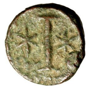 reverse: GIUSTINIANO I (527-565) Deka per Roma. Busto front. diad. con globo crucigero R/ I tra stelle. Dumb. 331; Sear 308 (g. 6,03)  AE   +BB