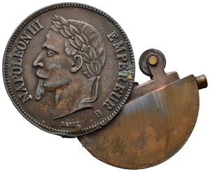 obverse: Impero Francese – Napoleone III (1852-1870) –  Accendino - Raro. Curioso accendino realizzato sulla forma e l’iconografia di una moneta da 5 franchi del 1870 di Napoleone III. Cu (Ø 37.5mm, 24.1gr). Conservazione SPL.  Raro (R).