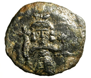 obverse: TIBERIO III (702-705) Follis per Siracusa. Busto front. diad. con croce e globo crucigero. R/ M sormontata da +; sotto, stella. All esergo, SCL. Dumb. 33; Sear 1396     AE  (g. 1,95)  RARO   qSPL