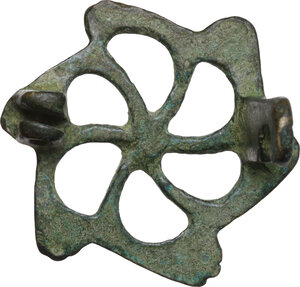 reverse: BRONZE OPENWORK FIBULA Roman period, c. 2nd - 4th century AD. Roman bronze fibula configured in a openwork hexahedron. Diameter: 29 mm