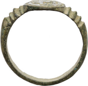 reverse: EARLY CHRISTIAN RING Roman period, c. 4th - 5th century AD Bronze ring with oval engraved beazel with the abbreviated christian inscription 