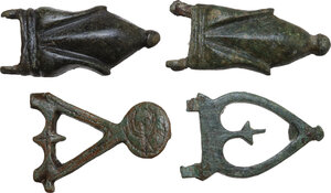 obverse: FOUR BYZANTINE BUCKLES PARTS Byzantine, c. 7th - 8th century AD. Lot of four bronze parts of buckles. All byzantine. Lenght: 41 to 36 mm
