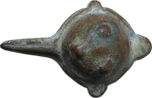 reverse: BRONZE ARAB-BYZANTINE ITEM Byzantine, c. 5th - 10th century AD. Arab-Byzantine oil lamp filler or cosmetic mortar with hemispherical body, deep rounded bowl with three feet, from which extends a long channelled spout, a flat short handle and smaller lateral lugs. Dimensions: 82 x 52 mm