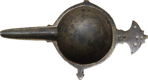 obverse: BRONZE ARAB-BYZANTINE ITEM Byzantine, c. 5th - 10th century AD. Arab-Byzantine oil lamp filler or cosmetic mortar with hemispherical body, deep rounded bowl with flat bottom, from which extends a long channelled spout, a flat decorated handle and smaller lateral lugs. Dimensions: 91 x 49.5 mm