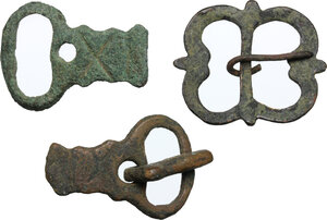 obverse: THREE ANCIENT BROOCHES Early Medieval period, c. 8th - 14th century AD. Lot of 3 (three) bronze belt terminals. Various dimensions