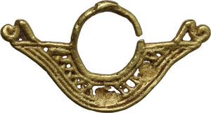 obverse: TAIRONA GOLD NOSE RING Colombia, Tairona culture, c. 10th - 17th century AD. Tairona culture nose ring in gold. Dimensions: 25.5 x 13.5 mm. Weight: 1.17 g