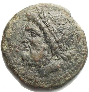 obverse: Mondo Greco. Sicilia. Panormos. AE 22,6 mm. I° secolo a.C. D/ Testa laureata di Zeus a sinistra. R/ Guerriero, stante a sinistra, tiene patera e lancia. A destra, scudo. Cfr. SNG ANS 587 e segg. gr 6,92. BB. Patina verde 