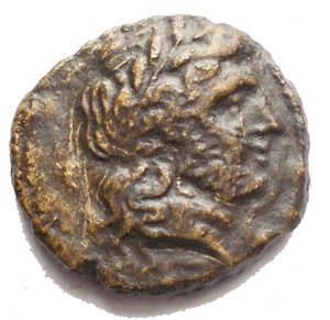 obverse: Campania, Neapolis Æ 16.03 mm. Circa 317-270 BC. Laureate head of Apollo to right; E behind / Man-headed bull walking to right, head facing; above, Phrygian helmet, below, monogram; ethnic in exergue. Sambon 625; SNG ANS 450; SNG BnF 913-7; SNG Copenhagen 492. 3.44g .