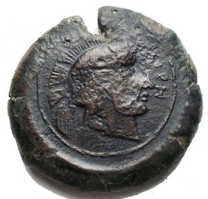 obverse: Mondo Greco -  Sicily, the Tyrrhenoi Æ Litra. Circa 354/3-336 BC. Overstruck on a Syracuse Drachm. Helmeted head of Athena right; TYPPH before / Athena standing facing, holding spear in right hand and resting hand on grounded shield to right. 29.26 g, 31,4 mm Near Very Fine; dark green patina. Extremely Rare and interesting.