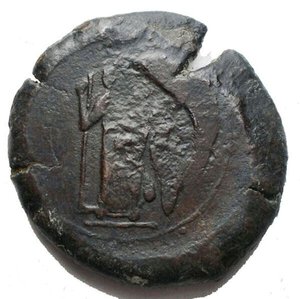 reverse: Mondo Greco -  Sicily, the Tyrrhenoi Æ Litra. Circa 354/3-336 BC. Overstruck on a Syracuse Drachm. Helmeted head of Athena right; TYPPH before / Athena standing facing, holding spear in right hand and resting hand on grounded shield to right. 29.26 g, 31,4 mm Near Very Fine; dark green patina. Extremely Rare and interesting.