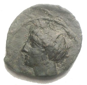 obverse: Siculo Punica. dopo il 400 a.C. Ae. D/ Testa di Kore verso sinistra. R/ Cavallo a ds e dietro una palma. Peso 2,63 gr. Diametro 16,2 mm. BB+. Patina verde