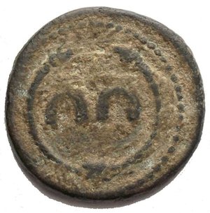 obverse: Anonymous issues. temp . Domitian, AD 81-96. Æ Tessera (18,04mm, 3,011 g). Two horseshoes within serpent-headed torque / TRI-VMP, IO-IO across field, olive-branch. BMCRE p. 412, note 7; Göbl, Antike pl. 9, 101; cf. Cohen pp. 267-8. VF, green patina  This enigmatic type belongs to a class of pseudo-currency some of which may have been intended to circulate as low-value denominations (mostly quadrantes), whilst others doubtless served non-numismatic functions, such as tickets or gambling counters. The precise meaning of the types and legends is unclear, though there seems to be some association with a military triumph. The connection with Domitian appears to be established by a coin with similar reverse bearing a bust of Minerva on obverse and the inscription IMP DOMIT AVG GERM (cf. Cohen 300, no authority cited).