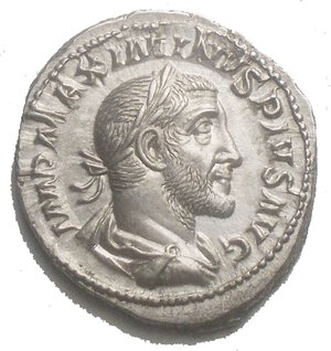 obverse: Maximinus I AR Denarius.Maximinus I AR Denarius. Rome, AD 235. Laureate, draped and cuirassed bust right / Maximinus standing left between two standards, raising hand and holding sceptre. RIC 1; RSC 46. 2.9g, 19.04 x 20.7mm about Extremely Fine/ Very Fine