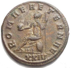 reverse: TACITUS (275-276). Antoninianus. Siscia. Obv: IMP C M CL TACITVS P AVG. Radiate, draped and cuirassed bust right. Rev: ROMAE AETERNAE / XXIV Roma seated left, holding globe and sceptre; shield below. Condition: Good very fine. Patina on silver plating Weight: 3.6 g. Diameter: 21.97 mm.