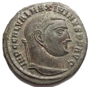 obverse: Maximinus II Daia AD 310-313. Nicomedia Follis Æ 21.9 x 21.4 mm, 4.6 g d/IMP C GAL VAL MAXIMINVS P F AVG, laureate head right r/ SOLI INVICTO/ */ Δ/ SMN, radiate Sol in long robe, standing facing, head to left, with right hand raised and left holding head of Serapis. RIC 77b. EF