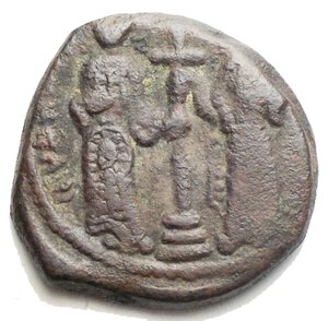 reverse: Constantine X Ducas and Eudocia AD 1059-1067. Constantinople Follis Æ. 6,83 g. d/ Eudocia on left, wearing loros with kite-shaped lower panel and crown with cross and pendilia; Constantine on right, wearing loros and crown with cross and pendilia, both standing facing, holding labarum with cross-piece on shaft between them, standing on base and three steps, each places one hand on heart. r/ Christ standing facing on footstool, wearing nimbus and holding Gospels, IC XC across fields.