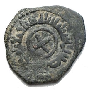 obverse: Messina. Ruggero II (1105-1154) 1/2 Follaro. D/ Croce, intorno leggenda cufica. R/ Leggenda cufica. AE. Sp.80/81. gr 1,06. BB+. Bella patina