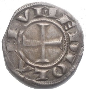 reverse: MILANO. ETA  COMUNALE, METÀ XIII-INIZIO XIV SECOLO., Ambrosino d’argento  Croce potenziata. R/ Sant Ambrogio, mitrato e nimbato, seduto in cattedra di prospetto, stringe nella s. il pastorale e alza la mano destra in atto di benedire. Raro. g 2,85. mm 22,9 x 21,5. BB. Patina