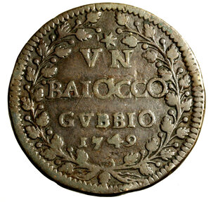 reverse: GUBBIO. Benedetto XIV (1740-1758)Baiocco 1749/ VIIII. Stemma R/ stella/ VN/ BAIOCCO/ GVBBIO/ 1749 tra rami.    (g. 14,48)   RARO    CU    +BB