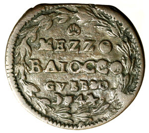 reverse: GUBBIO. Benedetto XIV (1740-1758) Mezzo baiocco 1744/ IV. Stemma R/ conchiglia/ MEZZO/ BAIOCCO/ GVBBIO/ 1744 in ghirlanda.   ( g. 5,76)    RARO    CU    +BB