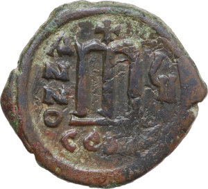 reverse: Tiberius II Constantine (578-582). AE Follis. Constantinople mint, 1st officina. Dated RY 7 (580/1)