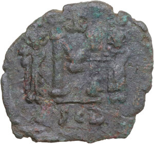 reverse: Constantine IV Pogonatus, with Heraclius and Tiberius (668-685). AE Follis. Syracuse mint. Struck 669-672 AD