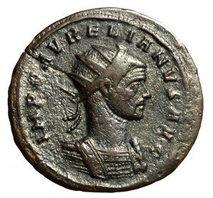 obverse: AURELIANO (270-275) Antoniniano per Ticinum. IMP C AVRELIANVS AVG, Busto rad a ds. R/ ORIENS AVG, Sole stante a sn. con globo calpesta un prigioniero a sn.; un altro in basso a ds. RIC 151     AE    BB