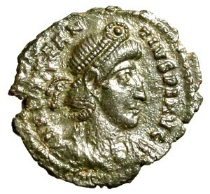 obverse: COSTANZO II (337-361) Follis ridotto per zecca incerta (355-361) (18 mm, g. 1.66) Busto diad. a ds. R/ Costanzo II, elmato e in abiti militari, stante a sn. con globo e scettro.   AE    raro    SPL    