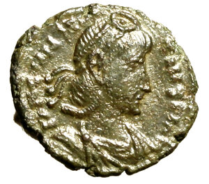 obverse: COSTANZO II (337-361) Follis ridotto per zecca incerta (355-361) (18 mm, g. 1.66) Busto diad. a ds. R/ Costanzo II, elmato e in abiti militari, stante a sn. con globo e scettro.   AE    raro    SPL    