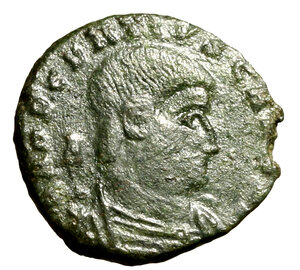 obverse: DECENZIO (351-352) Follis ridotto per Arles. Busto a ds. R/ Due vittorie alate tengono sollevato uno scudo; sopra, un chrismon, sotto, la lettera I. RIC 109.   AE  (g. 3.81)   RARO    BB