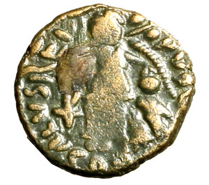 reverse: GIOVANNI Primicerio Usurpatore (423-425) AE4 per Roma. Busto diad. a ds. R/ Vittoria in cammino verso sn. trascina un prigioniero e tiene un trofeo sulla spalla; chrismon a sn. AE (g. 1.35, mm. 12) RIC 1916; LRBC 833. Raro      BB