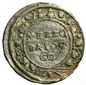 reverse: GUBBIO. Clemente XII (1730-1740) Mezzo baiocco A/ VI. Stemma R/ MEZZO/ BAIOC/ CO in ghirlanda di tralci di vite. Munt. 213.   (g. 5,96)   RARO  CU    +BB