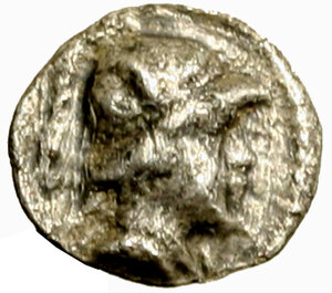 obverse: BACTRIA. Eucratide (170-145 a. C.) Obolo. Busto elmato a ds. R/ Cappelli dei Dioscuri. SNG ANS 496.    (g. 0,63)   AR    RARO   qSPL