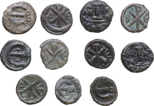 reverse: The Byzantine Empire. Lot of eleven (11) unclassified AE decanummi