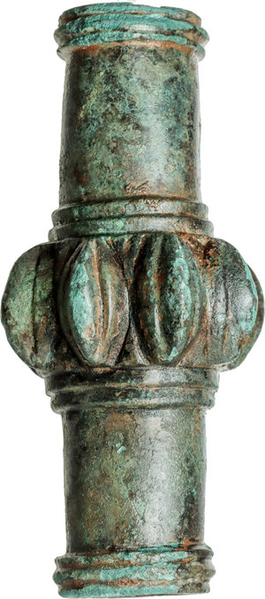 obverse: LURISTAN BRONZE SCEPTRE Iran, Luristan Culture, c. 8th century BC. Important bronze scepter or mace head, with tubular cross-section. In the middle part are eight knobs. Dimensions: 112 x 52 mm