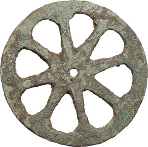 reverse: ANCIENT BRONZE WHEEL Greek world or Roman period, c. 1st millennium BC - 1st millennium AD. Medium-sized bronze wheel, composed of eight spokes, probably part of a toy. Diameter: 71 mm. Weight: 80 g